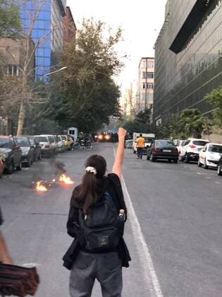 September 21, 2022, Tehran, Tehran, Iran: This photo shows a protester against the mandatory hijab during a protest over the death of a young woman who had been detained for violating the country s conservative dress code, in downtown Tehran, Iran. Iran faced international criticism on Tuesday over the death of a woman held by its morality police, which ignited three days of protests, including clashes with security forces in the capital and other unrest that claimed at least three lives. Tehran Iran - ZUMAi98_ 20220921_zih_i98_016 Copyright: xSocialxMediax