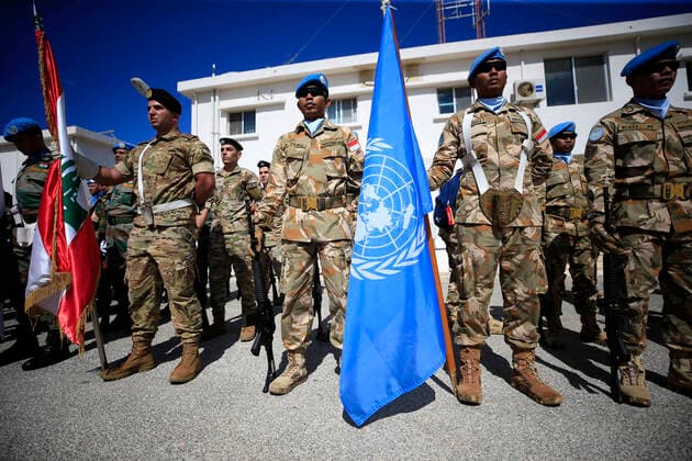 (220921) -- NAQOURA (LEBANON), Sept. 21, 2022 -- UNIFIL peacekeepers and Lebanese soldiers attend a ceremony marking the International Day of Peace in Naqoura, southern Lebanon, on Sept. 21, 2022. United Nations Interim Force in Lebanon (UNIFIL) on Wednesday confirmed its commitment to peace and security in southern Lebanon and stressed the importance of the partnership with the Lebanese Armed Forces in implementing UN Security Council Resolution 1701. (Photo by Xinhua) LEBANON-NAQOURA-UNIFIL-INTERNATIONAL DAY OF PEACE-CEREMONY AlixHashisho 