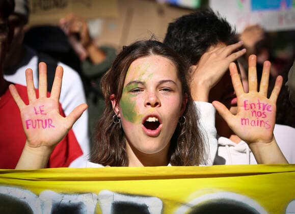 September 23, 2022, Montreal, Quebec, Canada: Thousands of protesters gathered for a climate march, demanding more action on climate change from elected officials. The event was part of the Fridays for Future Movement, an international, youth-led initiative inspired by Swedish activist Greta Thunberg. Some protesters showed their hands where the following quote was written: The future is in our hands. Montreal Canada - ZUMAs278 20220923_zip_s278_003 Copyright: xSerkanxSenturkx