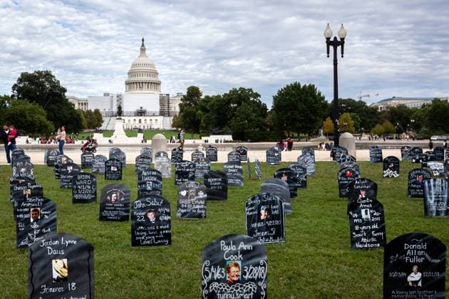 Opioid crisis demonstration at US Capitol Headstones of individuals lost to opioid use form a cemetery in front of the US Capitol. The art installation by Trail of Truth aims to call attention to the continuing opioid crisis in the United States. Each headstone represents a loved one lost to opioid use. Washington DC United States  Copyright: xAllisonxBaileyx originalFilename: bailey-opioidcr220924_npf1z.jpg