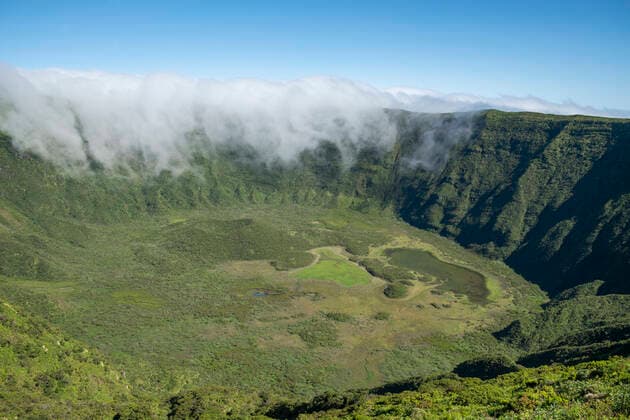 Creative Highlights World Portugal, Azores, Clouds pouring into vast green caldera, HLF01307