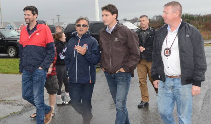 September 27, 2022, Sydney, NS, Canada: Prime Minister Justin Trudeau is briefed by MP Mike Kelloway, second left, while joined by MP Jaime Battiste, right, and MP Sean Fraser as they inspect the extensive damage caused by post-tropical storm Fiona in Glace Bay, N.S. on Tuesday, September 27, 2022. Sydney Canada - ZUMAc35_ 20220927_zaf_c35_134 Copyright: xVaughanxMerchantx