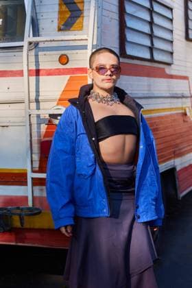 Young trendy homosexual male in skirt and sunglasses standing near van and looking at camera, Model released FranciscoSoberanis_LGTB_6 Copyright: xFranciscoxSoberanisx MR