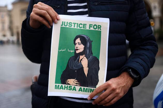 Solidarity Demonstration In Memory Of Mahsa Amini In Poland People attend solidarity demonstration in memory of Mahsa Amini, at the Main Square in Krakow, Poland on October 1st, 2022. Protests have erupted across Iran and worldwide after Mahsa Amini, a 22-year old Kurdish Iranian girl was brutally killed by the morality police of Islamic republic for her alleged failure to fully observe Islamic dress regulations. Krakow Poland  Copyright: xBeataxZawrzelx originalFilename: zawrzel-solidari221001_npBoj.jpg