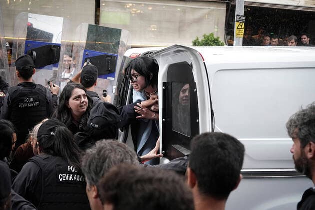 October 2, 2022, Ankara, Turkey: A protester is detained by the police during the demonstration. In Iran, Mahsa Amini was killed after being detained by the morality police in Tehran for allegedly violating the headscarf rules. In Ankara, women s organisations try to organise a protest about the situation but police intervenes in the protest on the grounds that permission was not obtained and some are arrested. Ankara Turkey - ZUMAs197 20221002_zaa_s197_127 Copyright: xTunahanxTurhanx