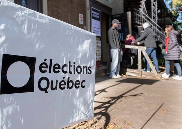 October 3, 2022, Montreal, PQ, Canada: People wait in line to vote on Quebec election day in Montreal, Monday, October 3, 2022. Montreal Canada  - ZUMAc35_ 20221003_zaf_c35_003 Copyright: xGrahamxHughesx