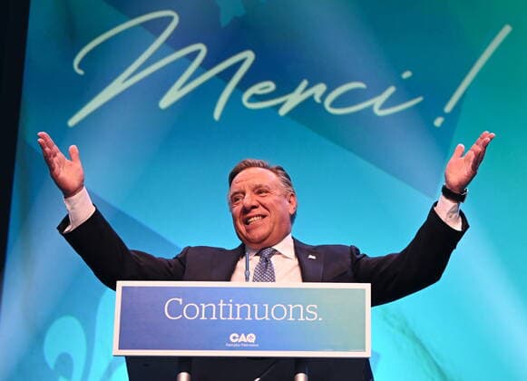 October 4, 2022, Quebec City, PQ, CANADA: CAQ Leader Francois Legault makes his victory speech to supporters at the Coalition Avenir Quebec election night headquarters, in Quebec City, Monday, Oct. 3, 2022. Quebec City CANADA  - ZUMAc35_ 20221004_zaf_c35_001 Copyright: xJacquesxBoissinotx