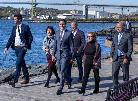 October 4, 2022, Dartmouth, NS, Canada: Prime Minister Justin Trudeau, centre, accompanied by regional MPs Sean Fraser, left to right, Ginette Petitpas Taylor, Darren Fisher, Lena Metlege Diab and Andy Fillmore heads to make an announcement about funds for victims of post-tropical storm Fiona in Dartmouth, N.S. on Tuesday, Oct. 4, 2022. Dartmouth Canada - ZUMAc35_ 20221004_zaf_c35_037 Copyright: xAndrewxVaughanx