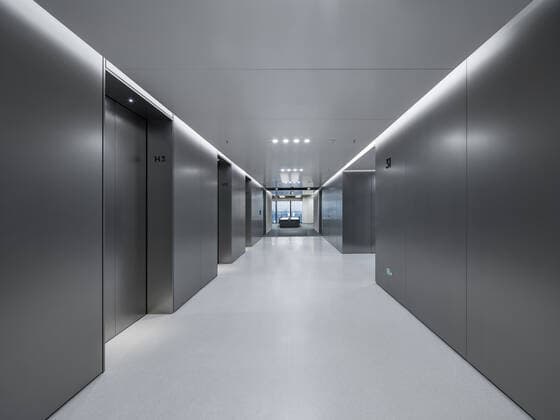 **VIDEO AVAILABLE: CONTACT INFO@COVERMG.COM TO RECEIVE** British architecture studio Foster + Partners has completed two skyscrapers - connected by an open-air suspension bridge, 105 meters above the ground - for Chinese drone manufacturer DJI in Shenzhen called DJI Sky City. DJI Sky City in Shenzen is comprised of the two 200-metre-high skyscrapers that now house the the robotics company and drone specialists DJI. The bridge is attached to each of the towers by vertically slatted cores, which both support a series of steel truss-encased, glass volumes that were stacked and cantilevered on top of one another. Its ground floor houses public facilities, including a community healthcare centre, and lobbies that each contain an indoor zen g Copyright: xx 52040749 EDITORIAL USE ONLY. NOT FOR USE BY NEWSPAPERS BASED IN THE UK.