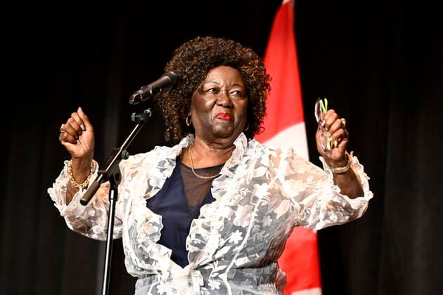 October 5, 2022, Ottawa, ON, CAN: Jean Augustine, who became the first Black female Member of Parliament in 1993 and the first Black woman in Cabinet in 2002, gestures as she steps in front of the microphone to speak after the premiere of Steadfast, a film about her life, at the National Gallery of Canada in Ottawa, on Wednesday, Oct. 5, 2022. Ottawa CAN - ZUMAc35_ 20221005_zaf_c35_051 Copyright: xJustinxTangx