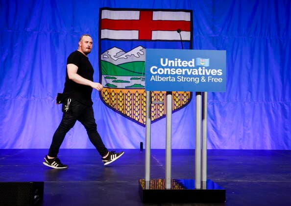 October 6, 2022, Calgary, AB, CANADA: A technician walks across the stage prior to the United Conservative Party of Alberta s leadership announcement in Calgary, Alta., Thursday, Oct. 6, 2022. Calgary CANADA  - ZUMAc35_ 20221006_zaf_c35_139 Copyright: xJeffxMcintoshx