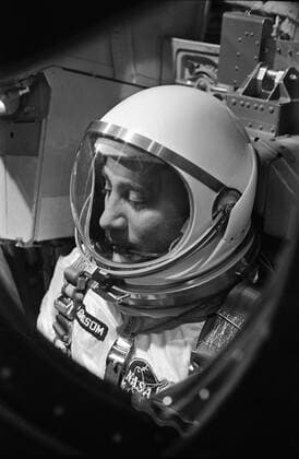 RECORD DATE NOT STATED (23 March 1965) --- Astronaut Virgil I. Grissom, the command pilot of the Gemini-Titan 3 mission, is shown through the window of the open hatch on the Gemini spacecraft in the white room on the morning of the launch. 1062_36_M_-1012-