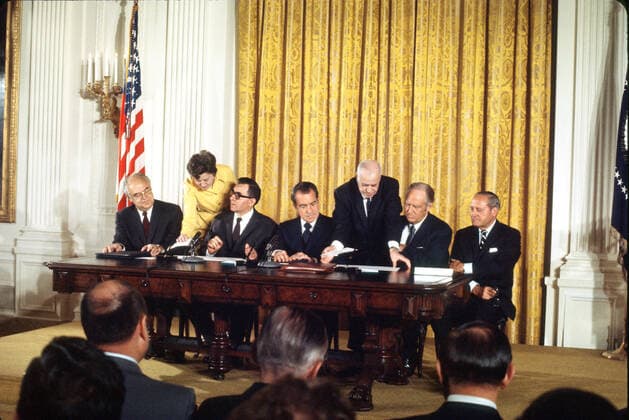 October 3, 1972, Washington, District of Columbia, USA: United States President Richard M. Nixon, center, observes during a signing ceremony for the instruments of ratification of the SALT agreements between the Union of Soviet Socialist Republics (USSR) and the United States in the East Room of the White House in Washington, DC on October 3, 1972. Pictured from left to right: Soviet Ambassador Anatoly F. Dobrynin, Soviet Foreign Minister Andrei Gromyko, President Nixon, US Secretary of State William P. Rogers and US SALT negotiator Gerard C. Smith. The agreements intend to restrain the growth of the nuclear arsenals of both nations Washington USA - ZUMAs152 19721003_zaa_s152_003 Copyright: xArniexSachsx