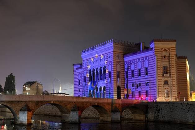 PXL_Sarajevo City Hall Sarajevo City Hall seen illuminated in the colors of the flag of the European Union, in Sarajevo, Bosnia and Herzegovina, on October 12, 2022.The European Commission on Wednesday recommended naming Bosnia and Herzegovina as an official EU candidate if several conditions are met a key step in the long process of joining the bloc. ArminxDurgut PIXSELL