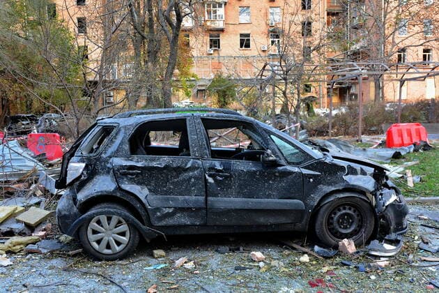 October 13, 2022, Kyiv, Ukraine: Damaged cars seen near the 101 Tower office building, which was targeted by the Russian missile strike. After several months of relative calm, multiple explosions rocked Kyiv early on a Monday morning. The head of the Ukrainian military said that Russian forces launched at least 75 missiles in Ukraine, with fatal strikes targeting the capital Kyiv, and cities in the south and west. Kyiv Ukraine - ZUMAs197 20221013_zab_s197_025 Copyright: xAleksandrxGusevx