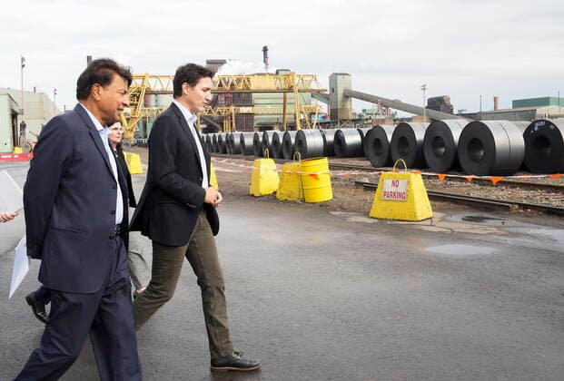 October 13, 2022, HAMILTON, ON, CANADA: Canadian Prime Minister Justin Trudeau, right, walks with ArcelorMittal Dofasco Executive chairman Lakshmi Mittal as they tour the ArcelorMittal Dofasco steel hot mill as the facility recently upgraded its manufacturing operations in Hamilton, Ont., Thursday, Oct. 13, 2022. HAMILTON CANADA - ZUMAc35_ 20221013_zaf_c35_043 Copyright: xNathanxDenettex
