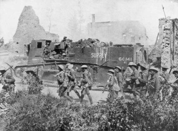 RECORD DATE NOT STATED Allied troops marching through a liberated town, 27 October 1918. Allied troops marching through a liberated town, 27 October 1918. Artist: Unknown 