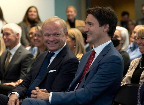 October 17, 2022, Ottawa, ON, Canada: Pekka Lundmark, President and CEO of Nokia and Prime Minister Justin Trudeau laugh to a comment made by Innovation, Science and Industry Minister Francois-Philippe Champagne on stage during an announcement , Monday, October 17, 2022 in Ottawa. Ottawa Canada  - ZUMAc35_ 20221017_zaf_c35_011 Copyright: xAdrianxWyldx