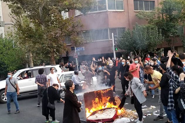 October 20, 2022, Tehran, Iran: A picture obtained by ZUMA outside Iran, reportedly shows protesters set fire as they clash with police during a protest over the death of young Iranian woman Mahsa Amini, who died on 16 September after being arrested in Tehran for not wearing her hijab appropriately in the capital Tehran on September 19, 2022. Iran has been facing worldwide anti-government protests following the death of Masha Amini, a 22-year-old girl, who was detained on 13 September by the police unit responsible for enforcing Iran s strict dress code for women. Amini was declared dead on 16 September, after she spent 3 days in a coma. According to the police, she fell into a coma and died of heart failure, while her family says that she - ZUMA 20221020_mda_i98_105 Copyright: xStringerx