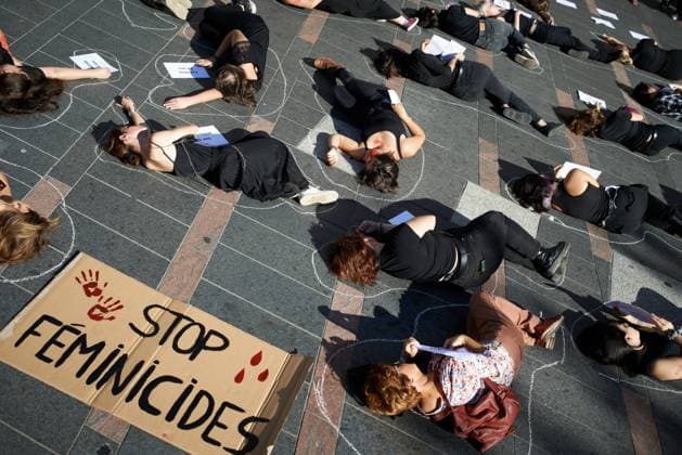 Die-in Against Feminicides And Violences Towards Women Women lie on the ground with sheets with the names and ages of women killed in 2022. Women from the collective NousToutes organized a die-in Toulouse against feminicides, sexual violence and patriarchy. Women read the names of all women killed in 2022 by men. They demand more meanings to the French government to protect women beaten by their partner. They say that 65% of killed women came to the police to make a complaint but police classifeied the complaints. They also ask police to have a better training to pay attention to these complaints. A French governmental body said that â‚¬1bn per year is necessary to tackle violence against women. Toulouse. France. October 22th 2022. Toulous  Copyright: xAlainxPittonx originalFilename: pitton-notitle221022_np453.jpg
