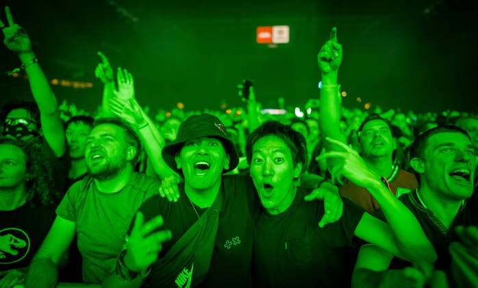 2022-10-23 00:02:57 AMSTERDAM - Visitors during Amsterdam Music Festival, which takes place in the Johan Cruijff ArenA during ADE. ANP MARCO DE SWART netherlands out - belgium out