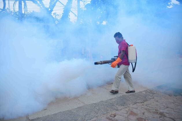 A worker fumigates a market area as a preventive measure against mosquito-borne diseases on World Malaria Day. World Malaria Day is observed annually on 25th of April to bring global attention on the efforts being made to bring an end to malaria and encourage action to reduce suffering and death from the disease. Agartala, Tripura, India. Â¬ÂxAbhisekxSahax xMajorityxWorld 925_32_MWC047755