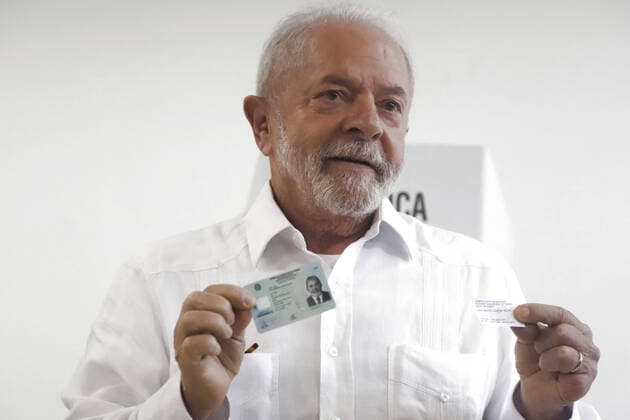 (221030) -- SAO PAULO, Oct. 30, 2022 -- Former Brazilian President Luiz Inacio Lula da Silva votes at a polling station in Sao Bernardo do Campo, Sao Paulo state, Brazil, on Oct. 30, 2022. On Sunday, Brazilians went to the polls to vote for the next president and vice president, as well as governors and deputy governors in 12 Brazilian states. The contested runoff pits President Jair Bolsonaro (Liberal Party), who is seeking reelection, against former president Luiz Inacio Lula da Silva (Workers Party). Rahel Patrasso) BRAZIL-SAO PAULO-PRESIDENTIAL ELECTION RahelxPatraso 