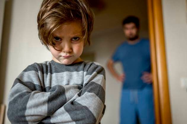 Father looking at angry son at home model released, Symbolfoto property released, ANAF00221