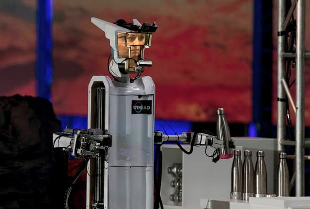 News Themen der Woche KW44 News Bilder des Tages November 05, 2022 - Long Beach, California, USA - The robot from Dragon Tree Labs in Singapore competes against 16 other international teams of roboticists from 10 countries in the finals of the ANA AVATAR XPRIZE at the Long Beach Convention Center. The competition, the culmination of a four-year process which began of March of 2018, challenges teams to develop physical, human-operated robotic avatar systems that can execute tasks and replicate a human s senses, actions and presence to a remote location in real time. THe teams attempt to push the limits of telepresence technology- robotics combined with artificial intelligence, sensors, virtual reality, haptics and more by testing their avatar creations on a series of complex tasks across - ZUMAce6_ 20221105_zaf_ce6_005 Copyright: xBrianxCahnx