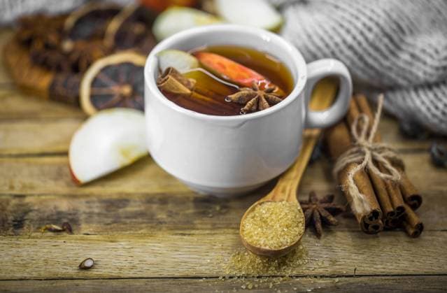 RECORD DATE NOT STATED a Cup of hot tea with a cinnamon stick and a spoonful of brown sugar on wooden background, holiday concept and warm mood , 36069146.jpg, tea, cinnamon, drink, cup, hot, glass, decoration, red, aroma, anise, aromatic, christmas, season, sticks, winter, beverage, wooden, food, closeup, nobody, spice, brown, teacup, holiday, background, warm, mulled, slice, delicious, punch, spiced, xmas, traditional, taste, fruit, sweet, life, still, close, seasoning, wine, clove, nutmeg, pine cone, seasonal, wintry, orange, pinecone, alcohol, spices