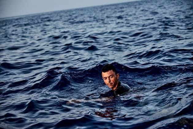 A Tunisian survivor jumped into the sea from the deck of the Ocean Viking. The man, exhausted by the conditions on board the humanitarian ship and the uncertainty concerning disembarkation, tried to commit suicide. He is about to be recovered by the rescuers of SOS Mediterranee.  AntoninxBuratx xLexPictorium LePictorium_0270070