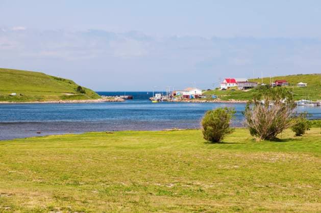 RECORD DATE NOT STATED Cape North in Nova Scotia. Nova Scotia, Canada. , 36638130.jpg, Atlantic, Canada, Cape Breton, Cape Breton Highlands National Park, Cape North, National Park, Nova Scotia, Town, beach, building, day, landmark, landscape, light, lighthouse, ocean, outdoors, sea, sunny, travel, village, white, bay, meadow, boat, fishing