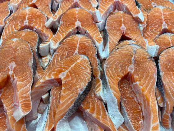 Survey Suggests 20 Per Cent Of Canadians Skipping Meals Due To High Food Costs Salmon steaks displayed at a grocery store in Mississauga, Ontario, Canada on November 11, 2022. The majority of respondents in a Canada-wide survey said they are using coupons or hunting for sales to cope with increasing food costs. Nearly 20 per cent were also reducing meal sizes or skipping meals altogether in order to save money. Nearly five per cent of those surveyed said they had stolen food out of necessity, and about five per cent had used a food bank or community fridge. Statistics Canada s consumer price index report said while the country s annual inflation rate dropped slightly to 6.9 per cent in September, the cost of groceries continued to climb. Gr  Copyright: xCreativexTouchxImagingxLtdx originalFilename: friedman-surveysu221111_np1O2.jpg