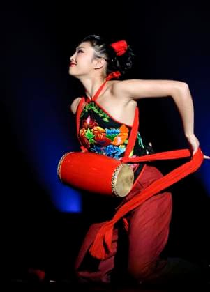 RECORD DATE NOT STATED CHENGDU - DEC 10: Group dance beat on drums and sing the aethereally song performed by Shaanxi Song And Dance Troupe at JINCHENG theater.DEC 10,2007 in Chengdu, China. Choreographer: Wang Hong, actors: 24 , 3771995.jpg, background, music, woman, girl, man, fashion, love, person, fitness, dance, folk, actor, actress, act, vitality, excited, passionate, jolly, active, art, conceptual, costume, creative, chinese, exercise, entertainment, glamour, jump, lady, drum, red, silk, hot, warm, model, movement, perform, stylish, theater, vogue, young, male, female, stage, skill, beat, sing, song, exaggerated, aerobics, acrobat,