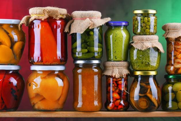 Jars with variety of pickled vegetables and fruits. Preserved food Jars with variety of pickled vegetables and fruits. Preserved food Copyright: xZoonar.com monticellox 13646782