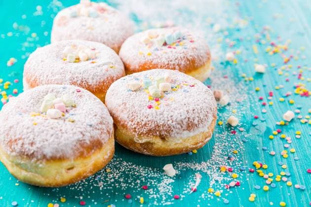 Carnival powdered sugar raised donuts - German Berliner donuts Carnival powdered sugar raised donuts - German Berliner donuts, Krapfen filled with jam Copyright: xZoonar.com IngridxBalabanovax 15071296
