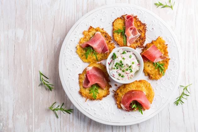 Potato pancake with prosciutto and dip of radishes cream cheese and chives. Healthy food concept. Potato pancake with prosciutto and dip of radishes cream cheese and chives. Healthy food concept. Copyright: xZoonar.com IngridxBalabanovax 15968234