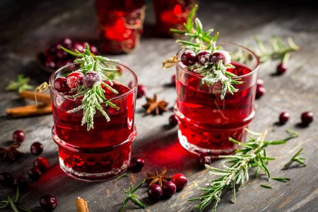 Cranberry mulled wine with rosemary for Christmas and winter time Cranberry mulled wine with rosemary for Christmas and winter time Copyright: xZoonar.com IngridxBalabanovax 17829164
