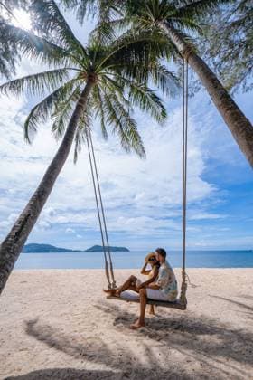 couple on the beach in phuket relaxing on beach chair, tropical beach in Phuket Thailand couple on the beach in Phuket relaxing on a beach chair, tropical beach in Phuket Thailand. Nakalay beach Copyright: xZoonar.com FOKKExBAARSSENx 17870702 ,model released, Symbolfoto ,property released