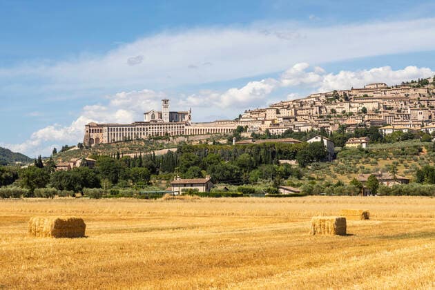 Assisi village in Umbria region, Italy. The town is famous for the most important Italian Basilica dedicated to St. Francis - San Francesco. Assisi village in Umbria region, Italy. The town is famous for the most important Italian St. Francis Basilica (Basilica di San Francesco) Copyright: xZoonar.com PaoloxGallox 18783307
