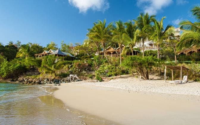 Tropical beach in Saint Lucia Caribbean, white tropical beach at a luxury resort in St Lucia Tropical beach in Saint Lucia Caribbean. white tropical beach at a luxury resort in St Lucia with palm trees Copyright: xZoonar.com FokkexBaarssenx 18966102