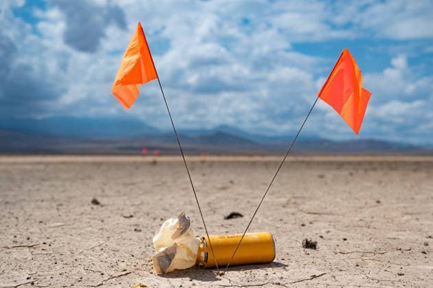 Bomblet dispersion is flagged on the Nevada Test and Training Range (NTTR), Nevada, Sept 13, 2022. The NTTR s mission is to create, operate, and maintain live and synthetic environments and integrate partners to optimize warfighter capabilities.