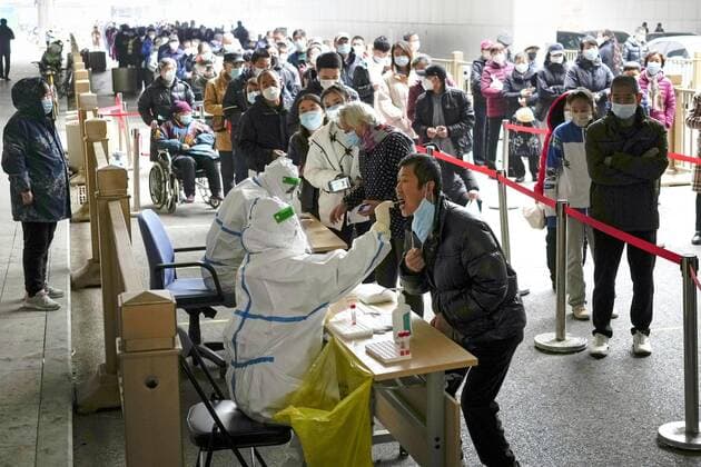 Zero COVID policy in China People line up for PCR tests in Beijing on Nov. 22, 2022, as authorities maintain the zero COVID-19 policy.  A14AA0001360574P