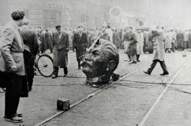 Stalin statue demolished by the Hungarian patriots, Budapest 1956 