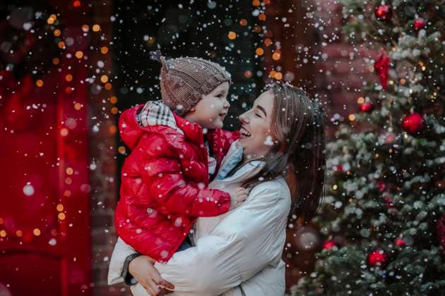 Cheerful woman with son enjoying in snow model released, Symbolfoto property released, MDOF00227