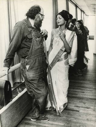 American poet Allen Ginsberg talking with Bangladeshi poet Farida Majid at the Poetry International meeting, London, UK 1973 