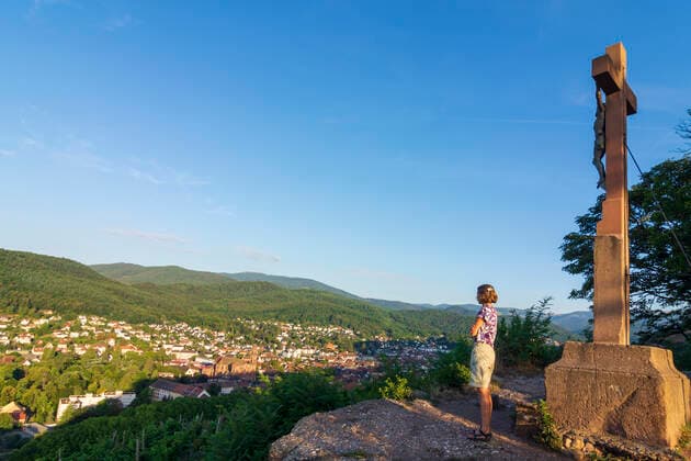 view to Guebwiller (Gebweiler), mission cross, tourists Guebwiller (Gebweiler) Haut-Rhin (Oberelsass) France Alsace (Elsass)