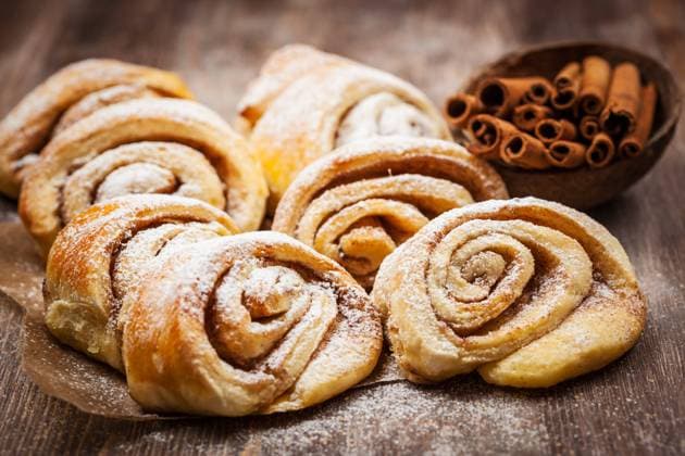Homemade cinnamon rolls on wooden table Homemade cinnamon rolls on wooden table Copyright: xZoonar.com IngridxBalabanovax 7389135