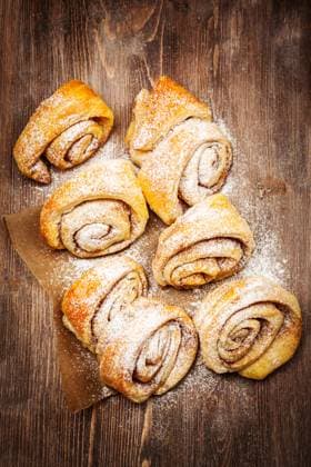 Homemade cinnamon rolls on wooden table Homemade cinnamon rolls on wooden table Copyright: xZoonar.com IngridxBalabanovax 7389157