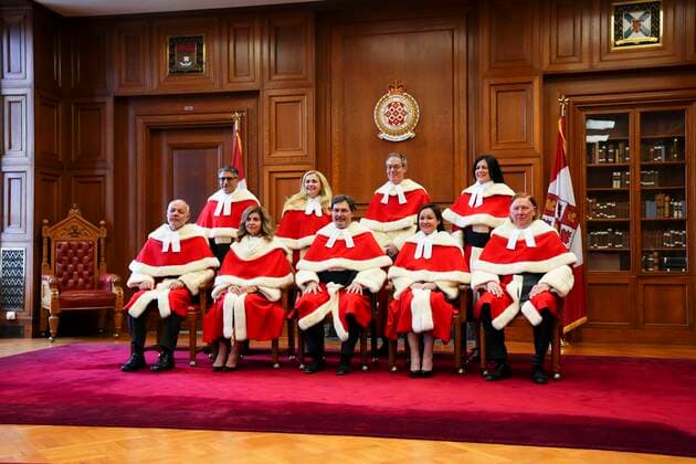 November 28, 2022, Ottawa, ON, Canada: Justice Michelle O Bonsawin, top right, takes part in a group photo with Judges Mahmud Jamal, back row left to right, Sheilah L. Martin, Nicholas Kasirer, and Russell Brown, bottom row left to right, Andromache Karakatsanis, Richard Wagner, Suzanne Cote, and Malcolm Rowe prior to her welcoming ceremony at the Supreme Court of Canada in Ottawa, on Monday, Nov. 28, 2022. O Bonsawin is the first Indigenous judge to be appointed to the Supreme Court of Canada. Ottawa Canada  - ZUMAc35_ 20221128_zaf_c35_075 Copyright: xSeanxKilpatrickx